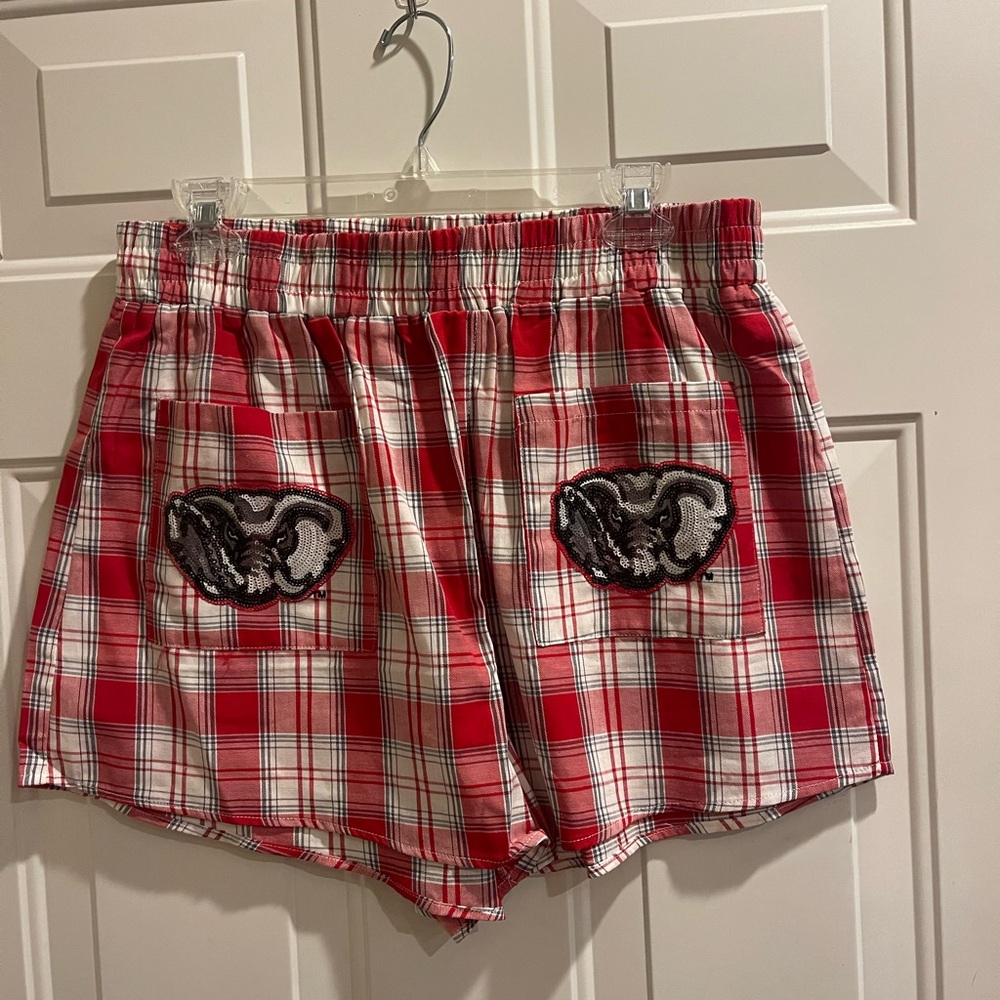 Queen of Sparkles plaid University of Alabama shorts.